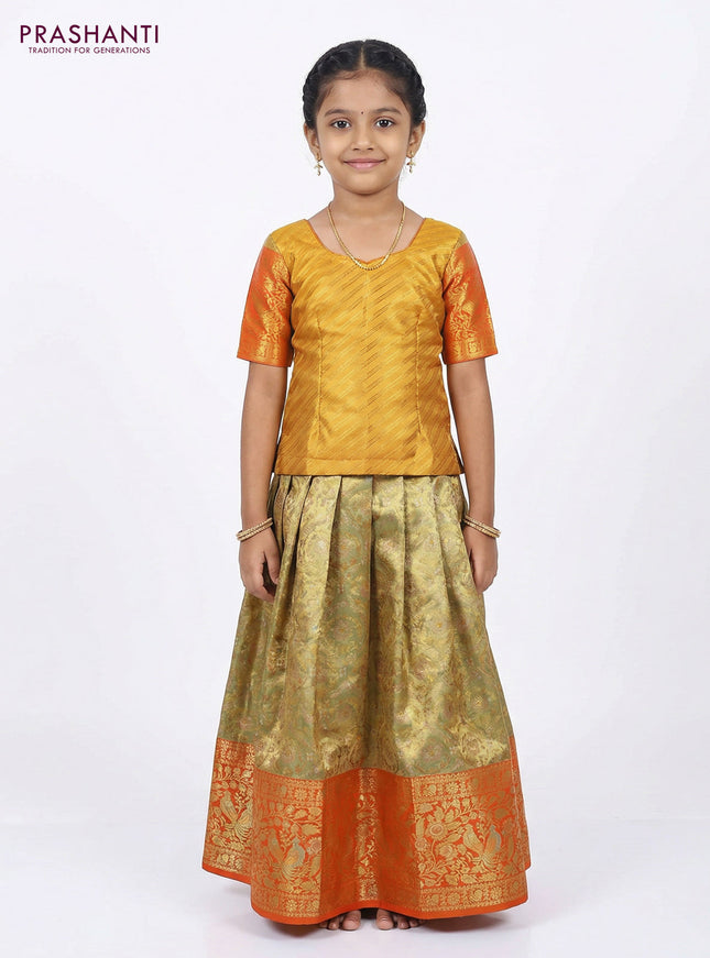 Pure silk tissue unstitched kids lehenga dual shade of pastel green and orange with allover silver zari woven brocade weaves and long rich zari woven border