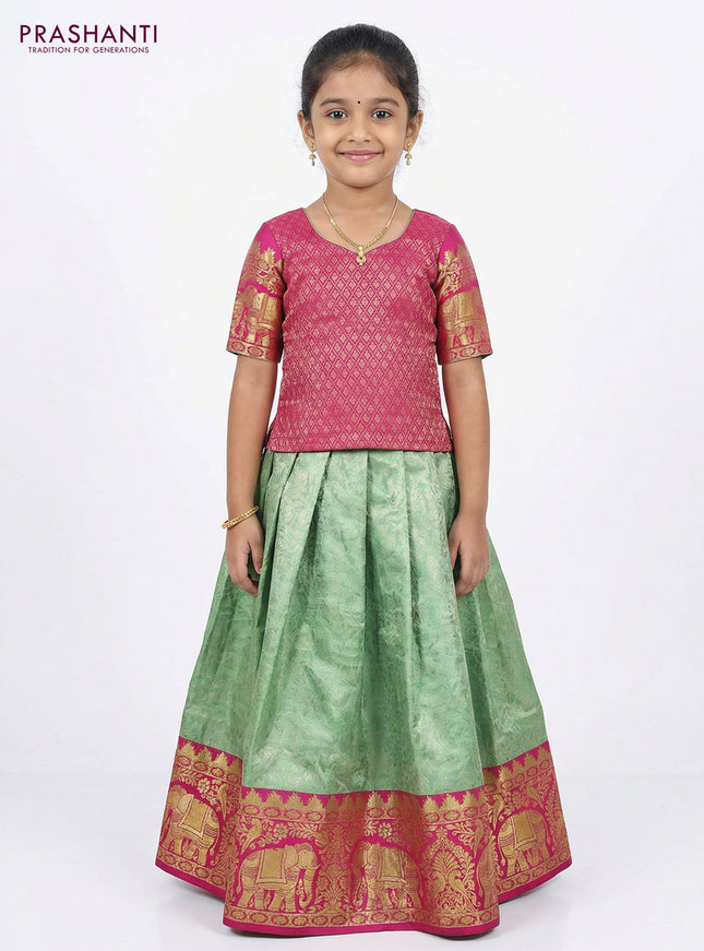 Pure silk unstitched kids lehenga pista green and pink with allover silver zari woven brocade weaves and rich zari woven border