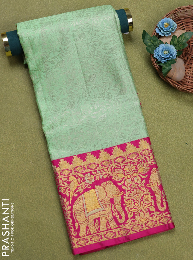 Pure silk unstitched kids lehenga pista green and pink with allover silver zari woven brocade weaves and rich zari woven border