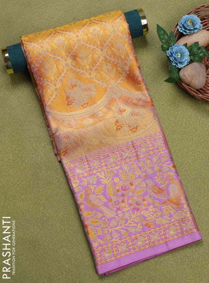 Pure silk unstitched kids lehenga dual shade of orange and lavender with allover silver zari woven brocade weaves and long zari woven border