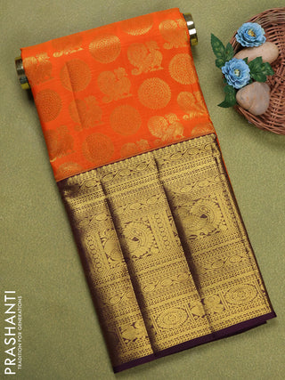 Pure silk unstitched kids lehenga orange and deep purple with allover zari woven annam & rudhuraksha buttas and long zari woven border