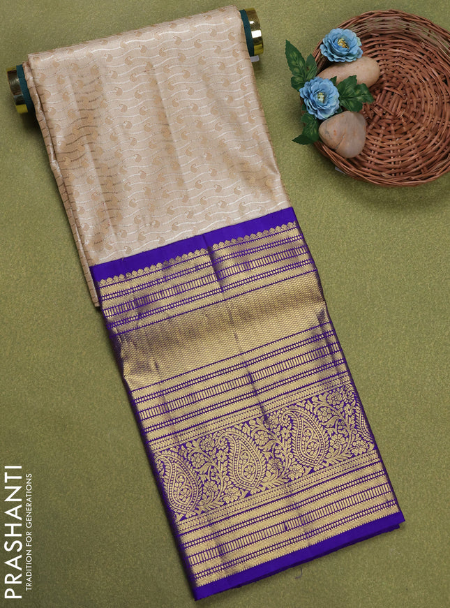 Pure silk tissue unstitched kids lehenga beige and blue with allover zari woven brocade weaves and long zari woven border