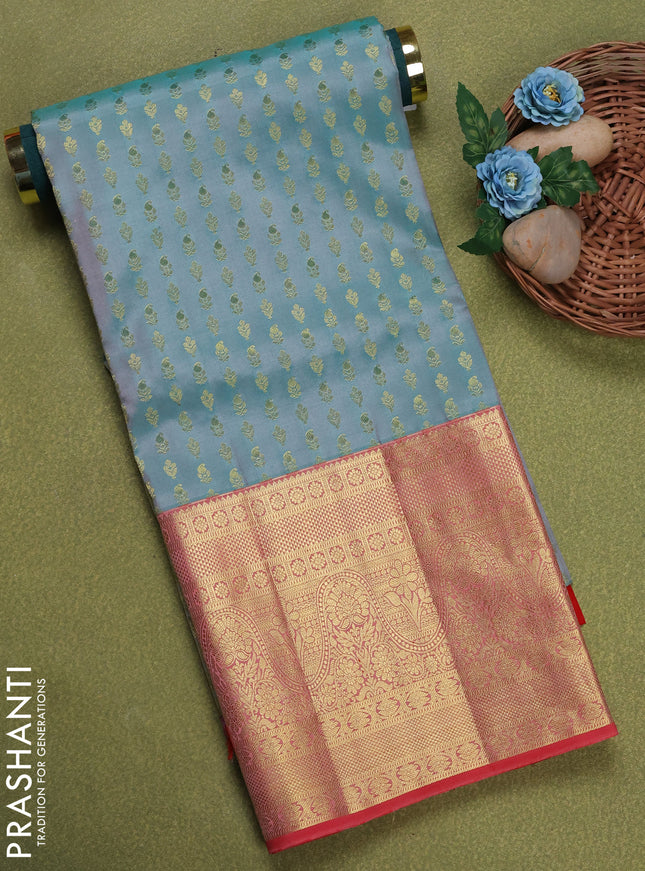 Pure silk unstitched kids lehenga teal shade and red with allover zari weaves and long zari woven border