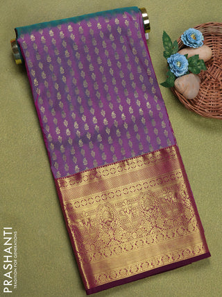 Pure silk unstitched kids lehenga dual shade of greenish purple and dual shade of pinkish yellow with allover zari weaves and long zari woven border