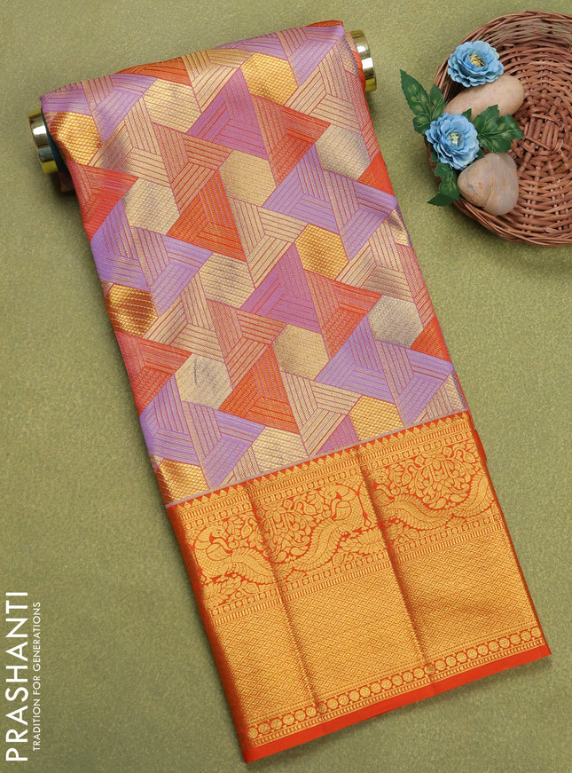 Pure silk tissue unstitched kids lehenga multi colour and orange with allover zari woven geometric brocade weaves and long zari woven border