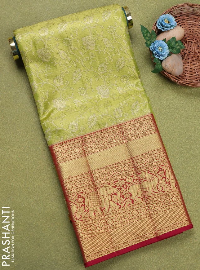 Pure silk tissue unstitched kids lehenga fluorescent green and maroon with allover silver zari woven brocade weaves and long zari woven border