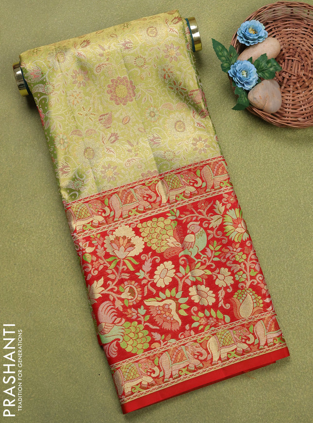 Pure silk tissue unstitched kids lehenga lime green and red with allover zari woven brocade weaves and long zari woven border