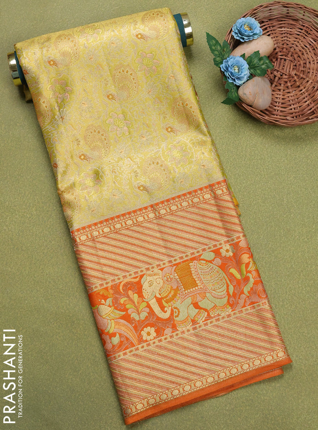 Pure silk tissue unstitched kids lehenga lime yellow and orange with allover silver zari woven brocade weaves and long zari woven border