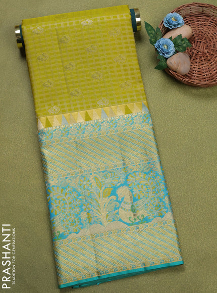Pure silk unstitched kids lehenga lime yellow and teal blue with allover zari woven brocade weaves and long zari woven border
