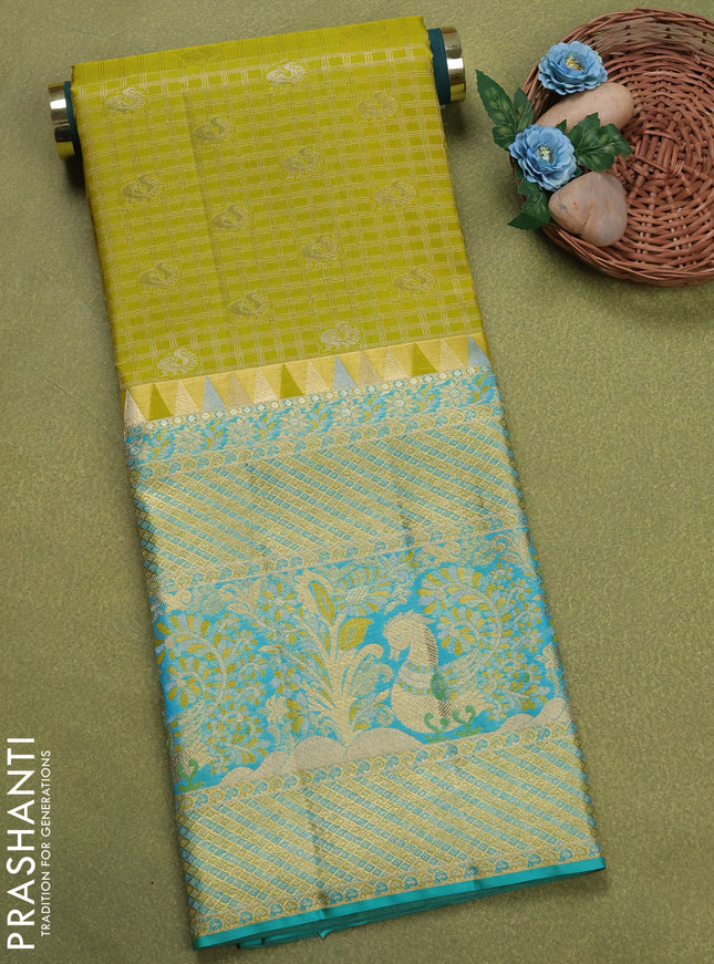 Pure silk unstitched kids lehenga lime yellow and teal blue with allover zari woven brocade weaves and long zari woven border