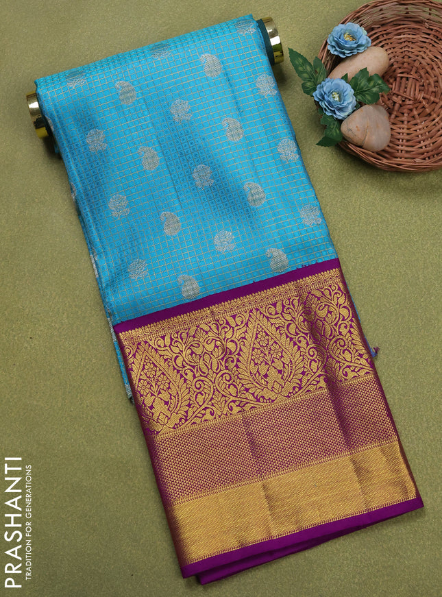 Pure silk unstitched kids lehenga teal blue and purple with allover zari woven brocade weaves and long zari woven border
