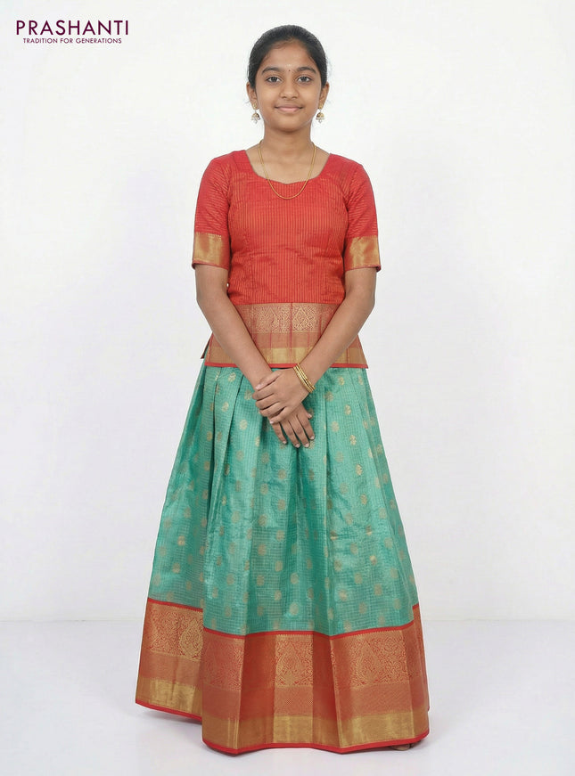Pure silk unstitched kids lehenga teal green shade and dual shade of pinkish orange with allover zari woven brocade weaves and long zari woven border