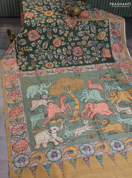 Semi tussar saree green and mustard yellow with allover kalamkari prints and mirror work