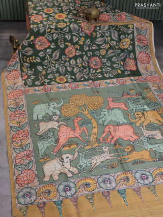 Semi tussar saree green and mustard yellow with allover kalamkari prints and mirror work