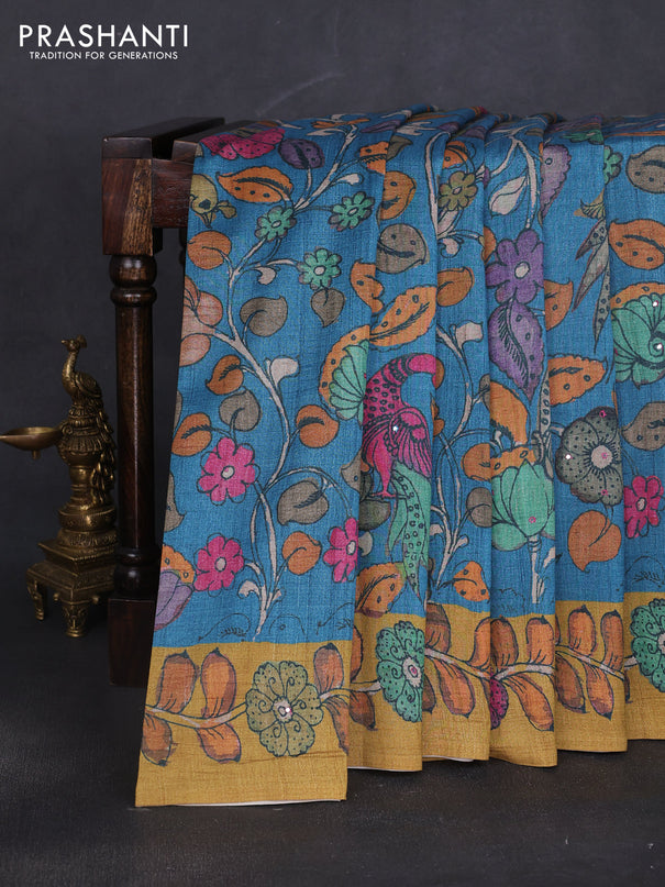 Semi tussar saree cs blue and green with allover kalamkari prints and mirror work