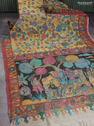 Semi tussar saree yellow and rustic orange with allover kalamkari prints and mirror work