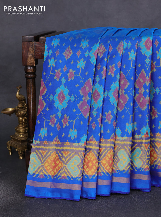 Rajkot patola silk saree cs blue with ikat woven buttas and ikat woven zari border