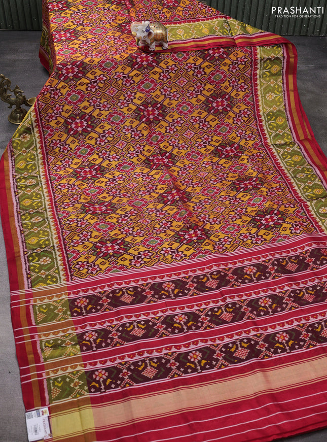Rajkot patola silk saree yellow and red with allover ikat weaves and ikat woven zari border