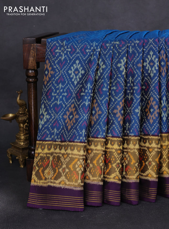 Rajkot patola silk saree peacock blue and violet with allover ikat weaves and ikat woven border