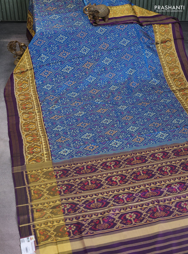 Rajkot patola silk saree peacock blue and violet with allover ikat weaves and ikat woven border