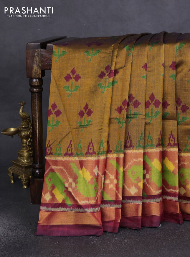 Rajkot patola silk saree dark mustard and deep maroon with allover ikat woven buttas and ikat woven zari border