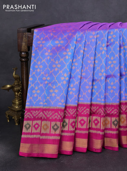 Rajkot patola silk saree dual shade of blue and maganta pink with allover ikat weaves and ikat woven zari border