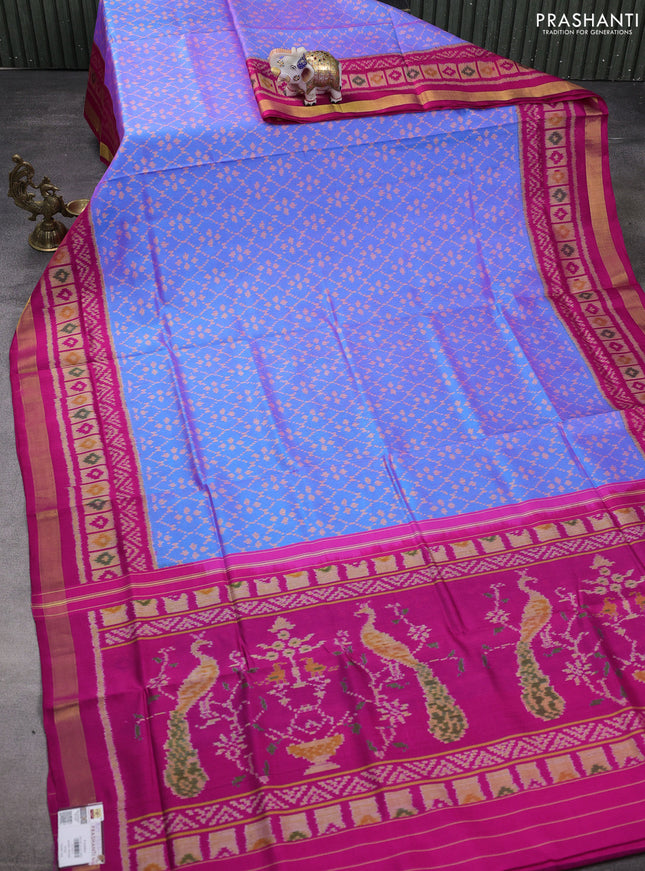 Rajkot patola silk saree dual shade of blue and maganta pink with allover ikat weaves and ikat woven zari border