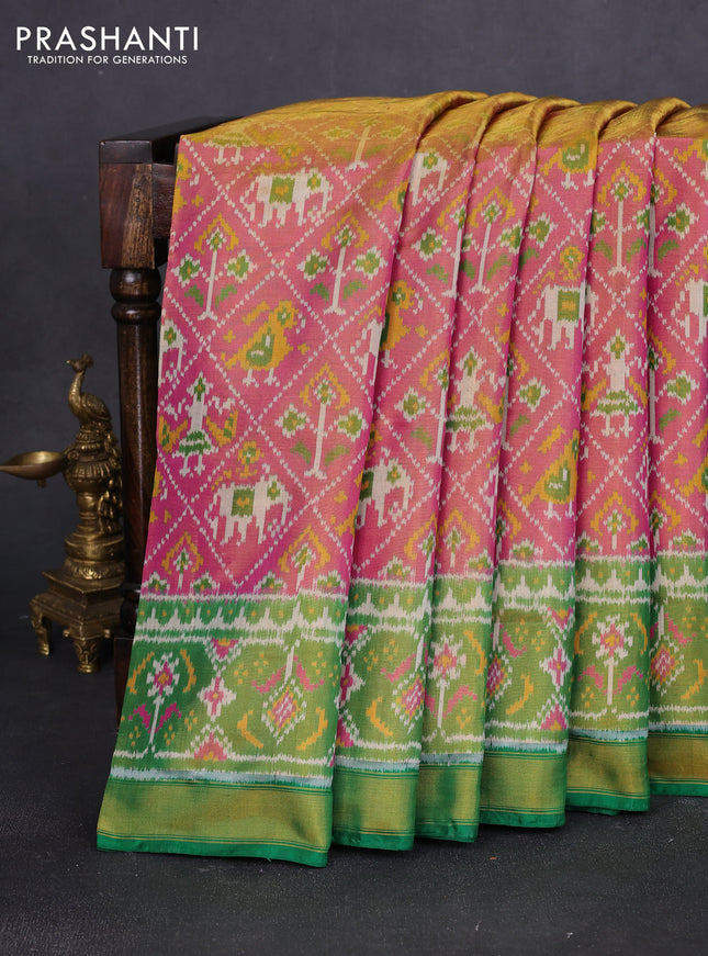 Rajkot patola tissue silk saree pink and green with allover ikat weaves and ikat zari woven border