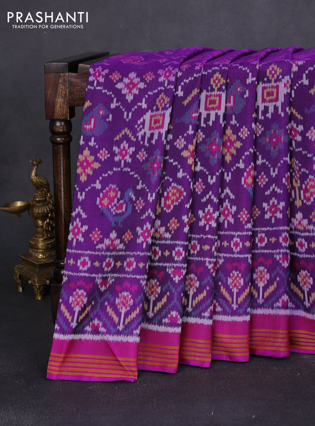 Rajkot patola silk saree purple with allover ikat weaves and ikat woven border