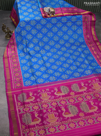 Rajkot patola silk saree cs blue and pink with alllover ikat woven buttas and ikat zari woven border