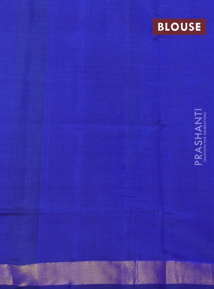 Rajkot patola silk saree dual shae of teal green and blue with allover ikat weaves and ikat woven border