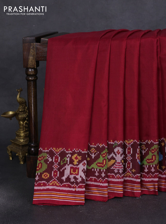 Rajkot patola silk saree maroon with plain body and ikat woven border