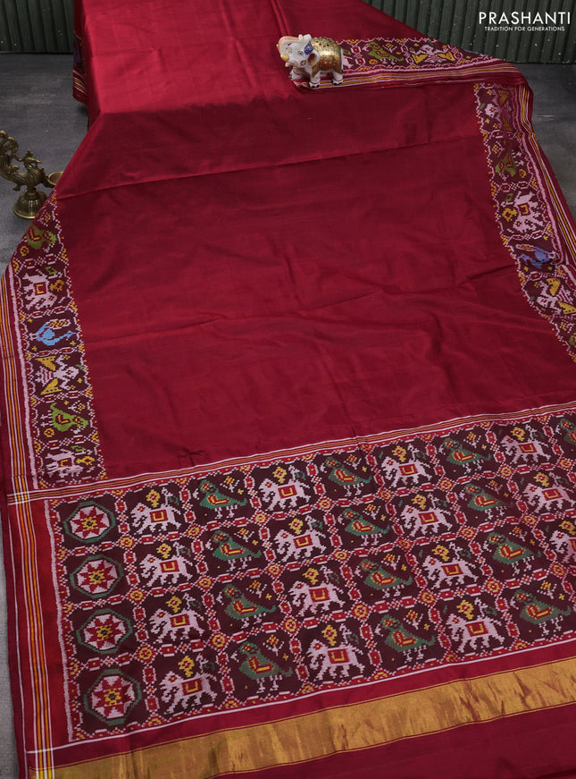 Rajkot patola silk saree maroon with plain body and ikat woven border