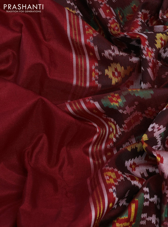Rajkot patola silk saree maroon with plain body and ikat woven border