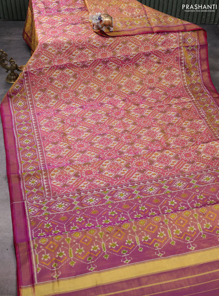 Rajkota patola tissue silk saree pink and dual shade of purple with allover ikat weaves and zari woven border