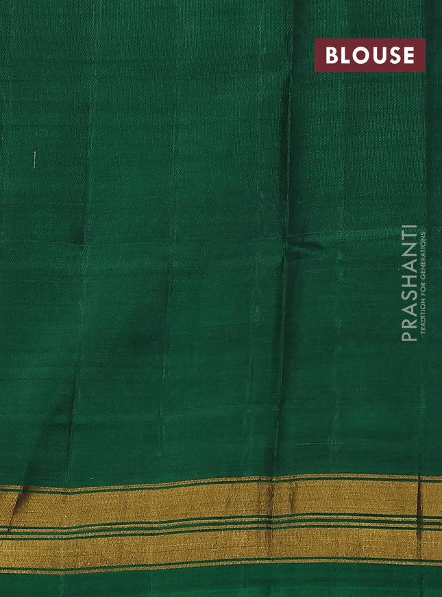Rajkot patola silk saree green with allover ikat weaves and zari woven border