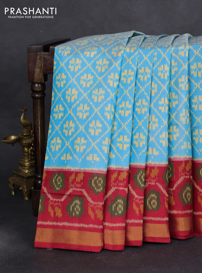 Rajkot patola silk saree light blue and red with allover ikat weaves and ikat woven zari border