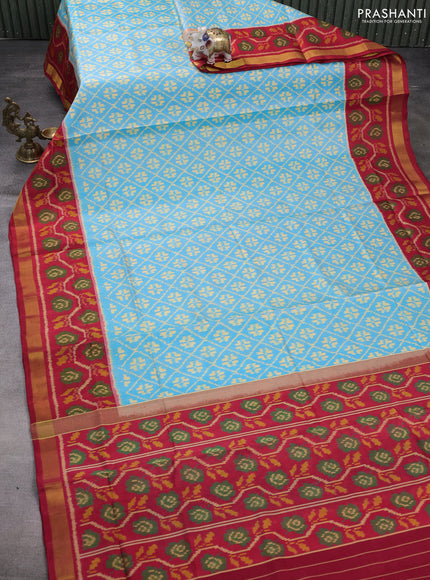 Rajkot patola silk saree light blue and red with allover ikat weaves and ikat woven zari border