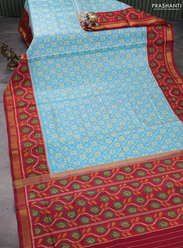 Rajkot patola silk saree light blue and red with allover ikat weaves and ikat woven zari border