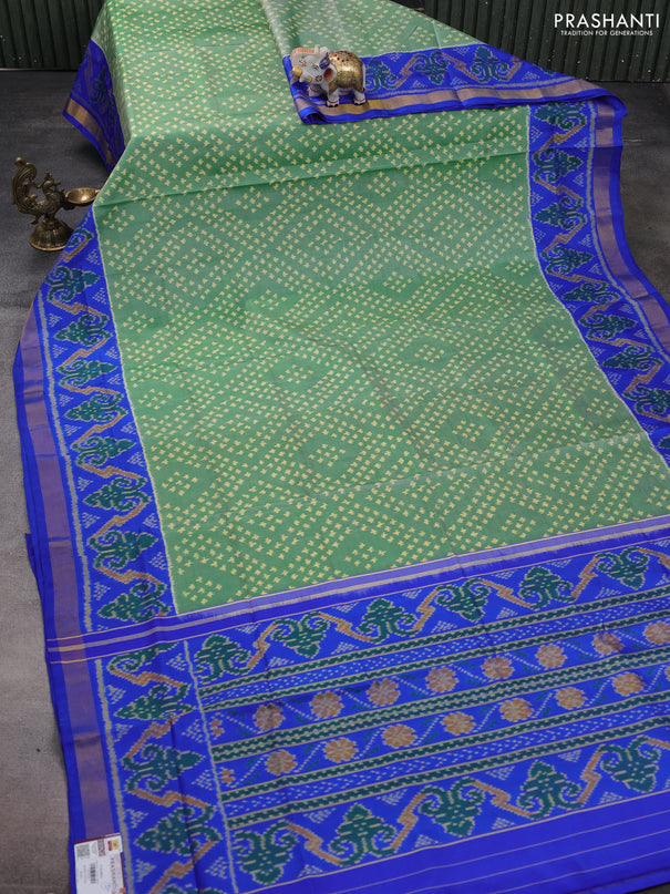 Rajkot patola silk saree green and royal blue with allover ikat weaves and ikat woven zari border