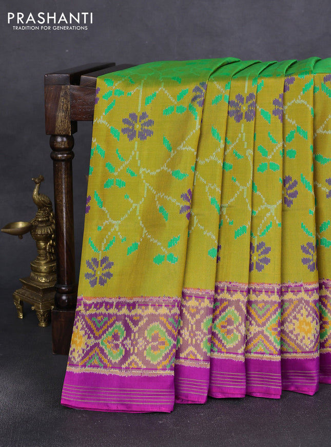 Rajkot patola silk saree light green and magenta pink with allover ikat weaves and ikat woven border