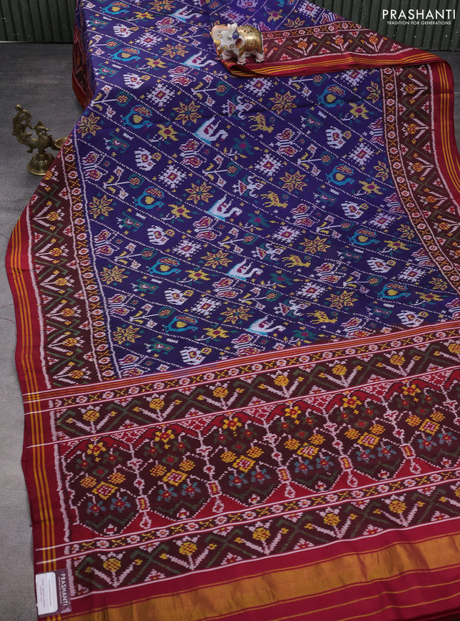 Rajkot patola silk saree navy blue and maroon with allover ikat weaves and ikat woven border