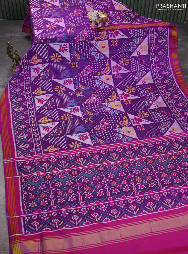 Rajkot patola silk saree purple and magenta pink with allover ikat weaves and ikat woven border