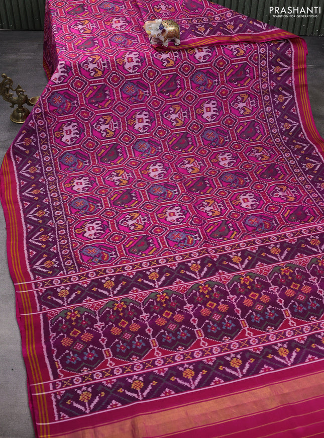 Rajkot patola silk saree dual shade of pink and purple with allover ikat weaves and ikat woven border