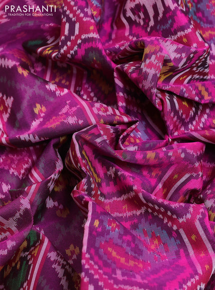 Rajkot patola silk saree dual shade of pink and purple with allover ikat weaves and ikat woven border