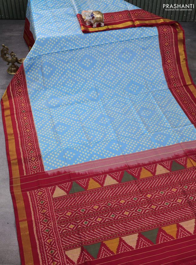 Rajkot patola silk saree light blue and maroon with allover ikat woven buttas and ikat woven zari border