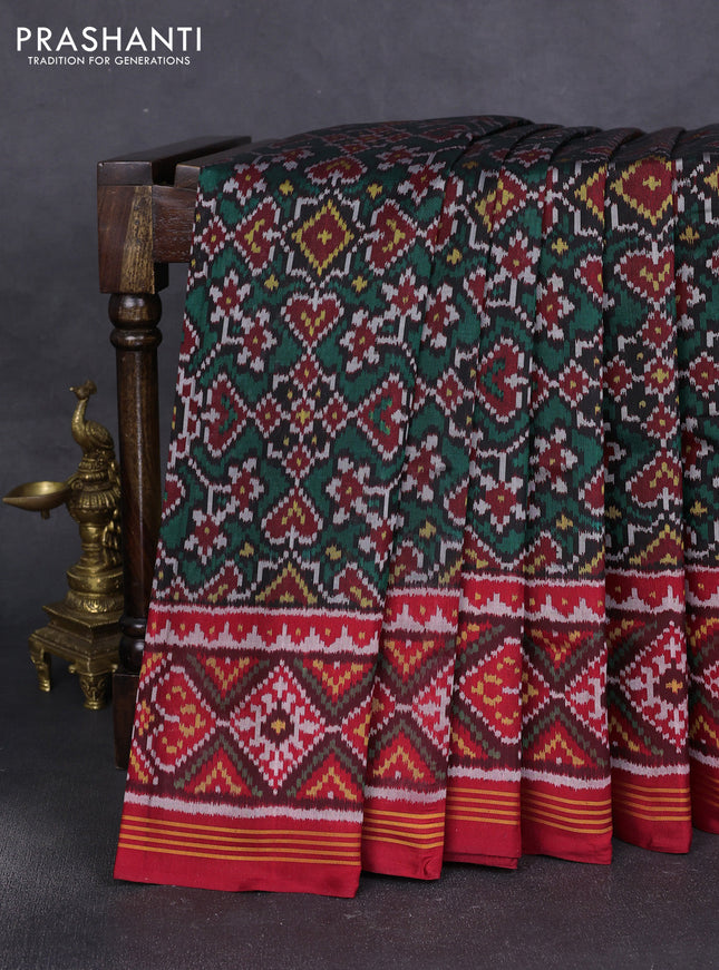 Rajkot patola silk saree green and maroon with allover ikat weaves and ikat woven border