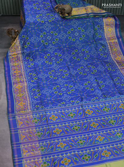 Rajkot patola silk saree dual shade of greenish blue with allover ikat weaves and ikat woven zari border