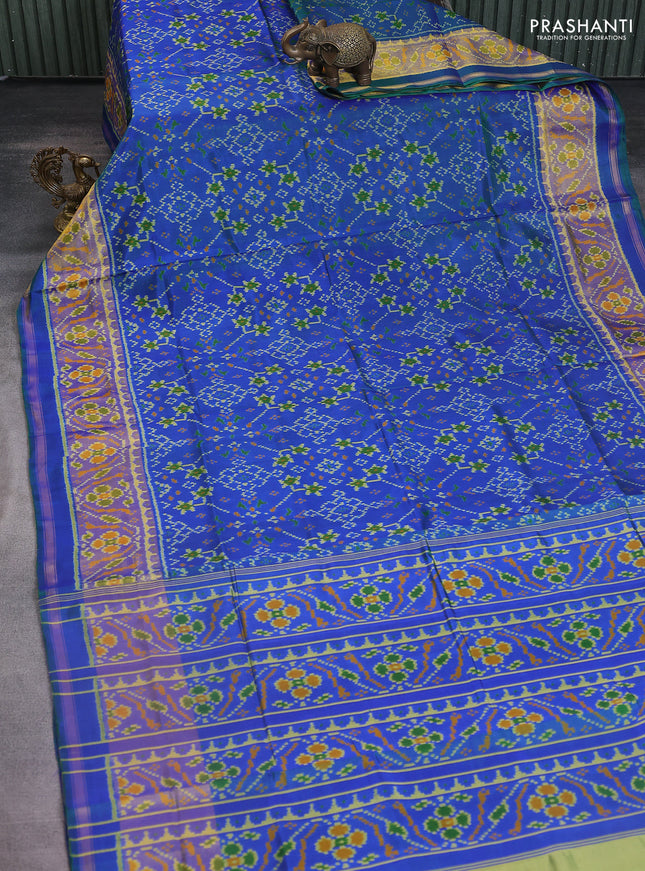 Rajkot patola silk saree dual shade of greenish blue with allover ikat weaves and ikat woven zari border