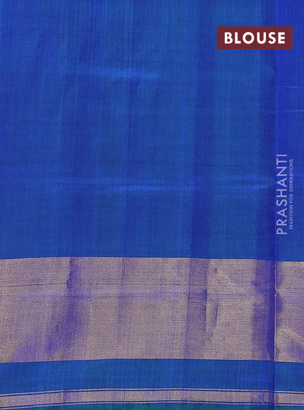 Rajkot patola silk saree dual shade of greenish blue with allover ikat weaves and ikat woven zari border